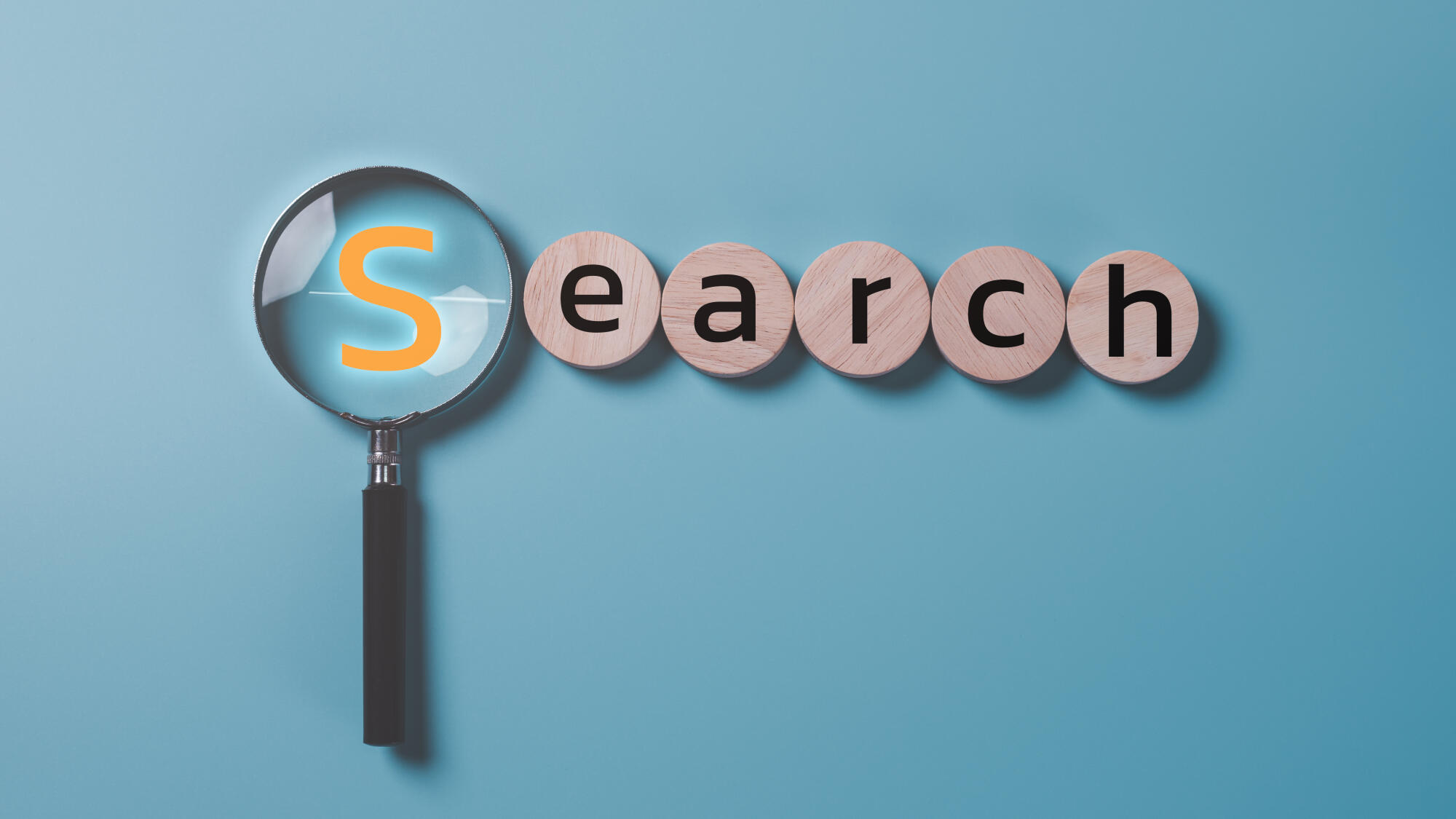 67a312d64cf67729d96b11db A magnifying glass is placed o